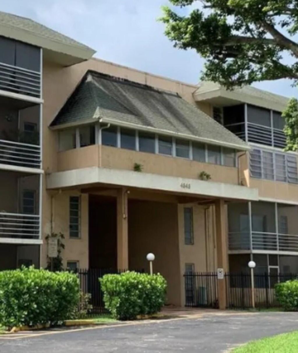 Photo of 4848 NW 24th Court #105, Lauderdale Lakes, FL 33313 (MLS # B26020558)