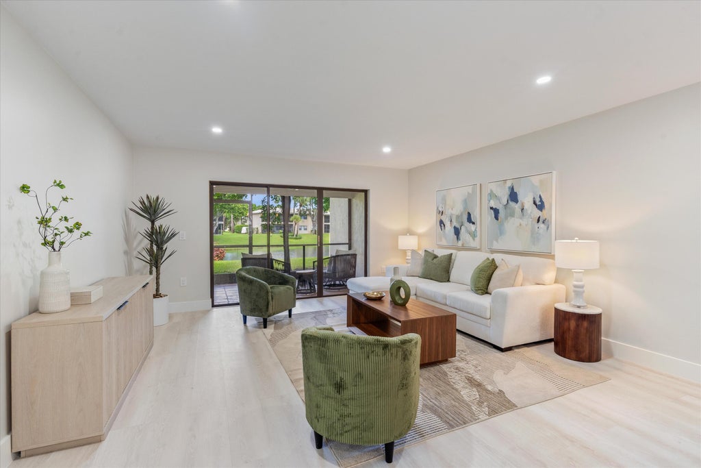 Photo of 31 Stratford Lane W #A, Boynton Beach, FL 33436 (MLS # B26066011)
