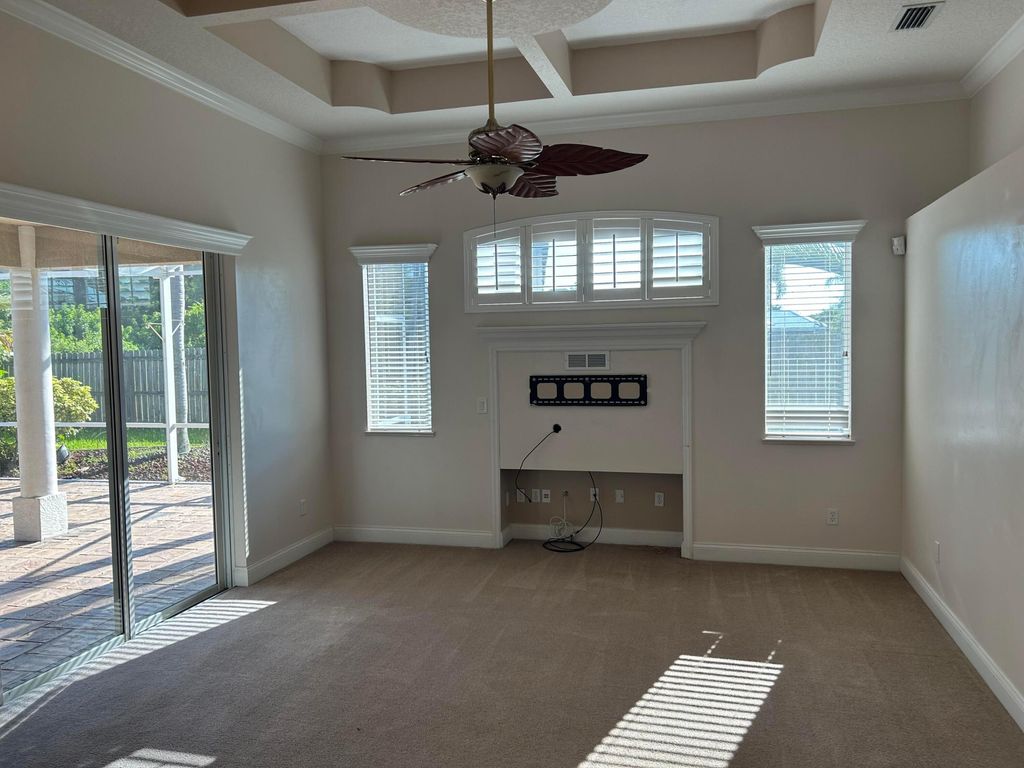 Photo of 6619 NW Omega Road, Port Saint Lucie, FL 34983 (MLS # B26020387)