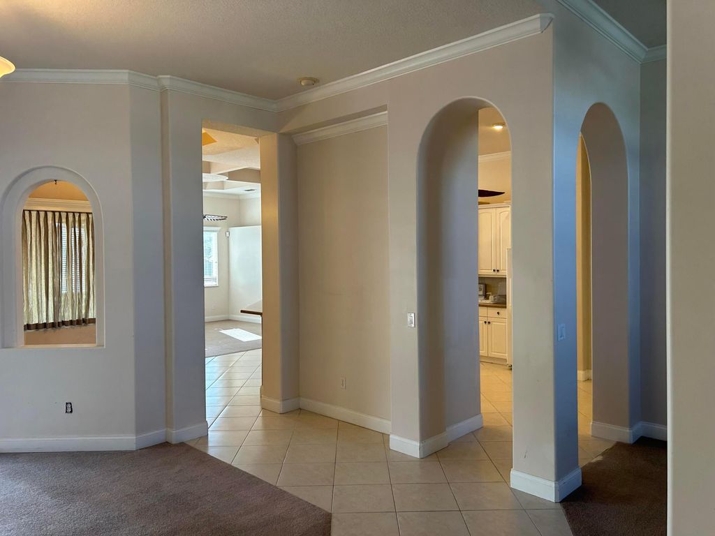 Photo of 6619 NW Omega Road, Port Saint Lucie, FL 34983 (MLS # B26020387)