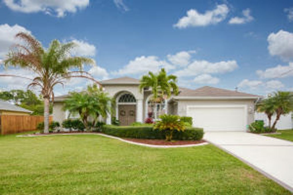 Photo of 6619 NW Omega Road, Port Saint Lucie, FL 34983 (MLS # B26020387)