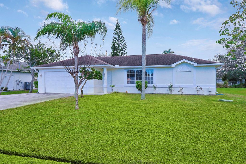 Photo of 2814 SE Melaleuca Boulevard, Port Saint Lucie, FL 34952 (MLS # R10947763)