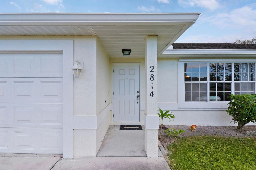 Photo of 2814 SE Melaleuca Boulevard, Port Saint Lucie, FL 34952 (MLS # R10947763)