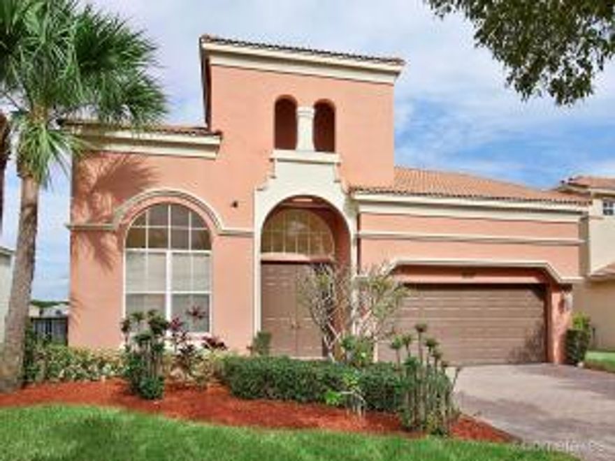 This upgraded Terrazza 6 model features 6 bedrooms and 4 full baths, including 2 bedrooms and full cabana bath on the first floor. Situated on a premium lakefront lot with expanded covered patio, oversized screen enclosure, fenced yard and courtyard with expanded pavers. Gourmet kitchen with brand new stainless steel appliances, granite with full height tile backsplash, upgraded cabinets with crown molding and refrigerator enclosure. Oak staircase with wrought iron balusters, diagonal tile in all living areas, upgraded tile in all bathrooms. Tile and grout professionally cleaned and color sealed. The oversized master suite includes his and her walk-in closets and a beautiful view overlooking the lake. Master bath has his and her sinks, upgraded tile and a frameless shower enclosure.