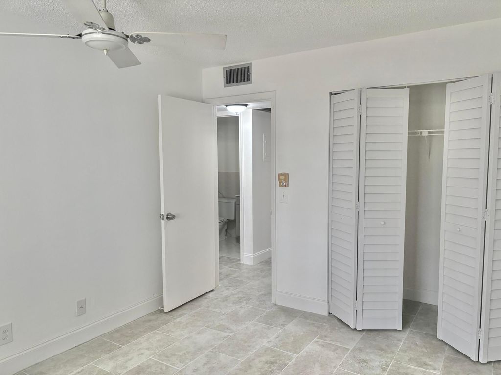 Photo of 239 Sussex L, West Palm Beach, FL 33417 (MLS # B26047114)