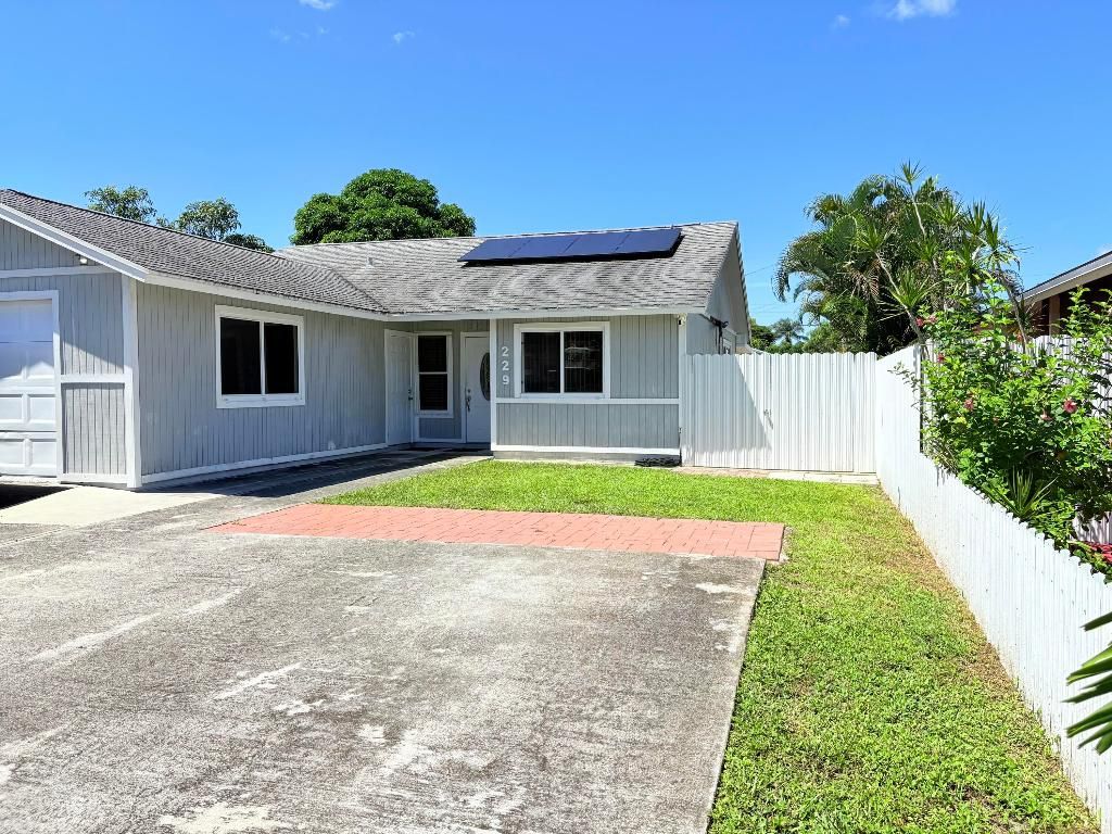 Photo of 229 Perry Avenue, Greenacres, FL 33463 (MLS # R11126137)
