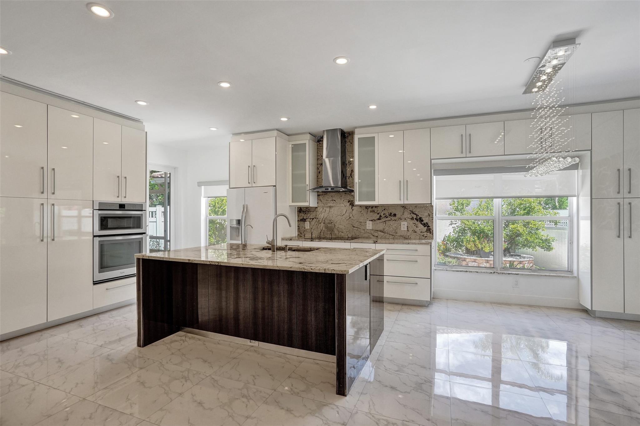 Absolutely stunning beautiful house nested in the prestigious gated NewPort community of Turtle Run! Open Floor Plan of Living room, kitchen and dining area. Luxury living style presented by many features such as bright/clean ceramic tiles, long vent AC, white wooden designed wall, custom cabinetry and granite countertops kitchen/bathrooms, impact Front & French patio doors. Freshly Painted Exterior, New Electric Boxes, Newer AC, Nest Thermostat, entire house LED lights. Garage has insulated door, AC, tile floor. Enclosed screen Patio, large side paver yard, spectacular peaceful back yard oversees community's green trees reserved . Avocado tree, papaya tree, etc. Convenience access shopping plaza, central Coral Spring “the Walks”, schools. EASY SHOWING! HURRY BEFORE IT'S GONE! HOA $150/MTH
