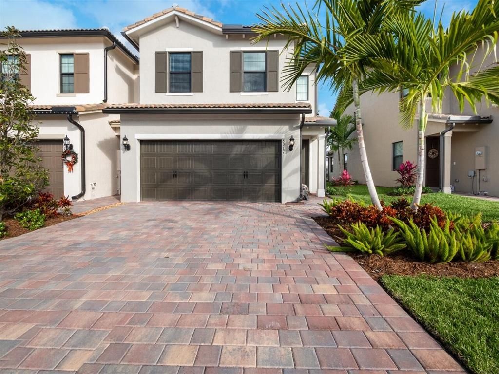 Photo of 8217 Cadre Noir Road Rd, Lake Worth Beach, FL 33467 (MLS # R10765907)