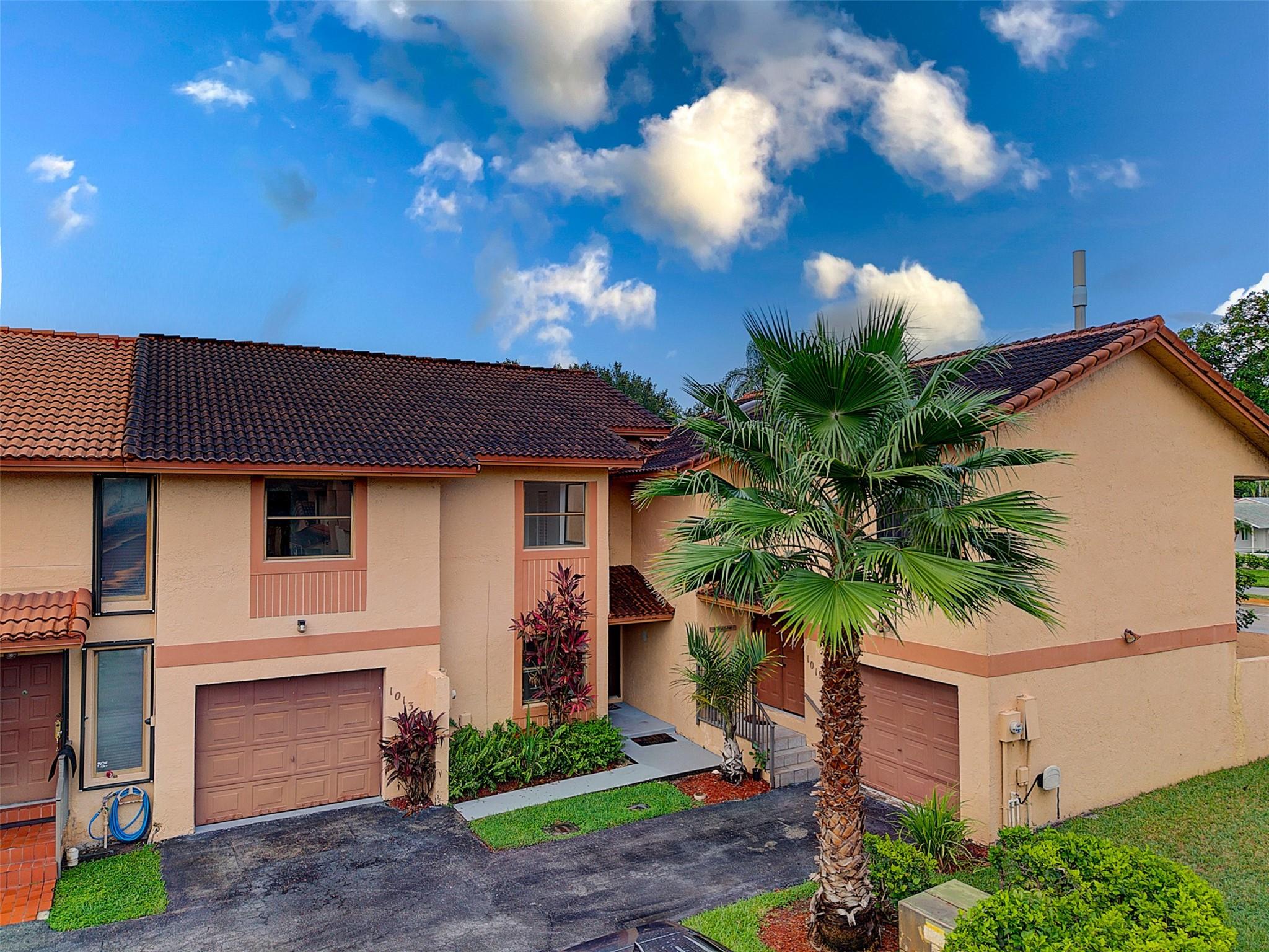 Welcome to this beautifully maintained 2-bedroom, 2.5-bath townhome with a versatile den—perfect for a home office or easily converted into a 3rd bedroom! Located in the gated community of Herons Landing, this bright and spacious home offers an open-concept living and dining area, a large kitchen, half bath for guests, and a private one-car garage with full sized washer and dryer. Enjoy your morning coffee or evening gatherings on the private patio, ideal for relaxing or entertaining. Upstairs, you’ll find generously sized bedrooms with walk in closets, and two baths. Residents enjoy resort-style amenities including a sparkling pool, clubhouse, fitness center, and tot lot. Conveniently situated near shopping, dining, schools, and major highways.