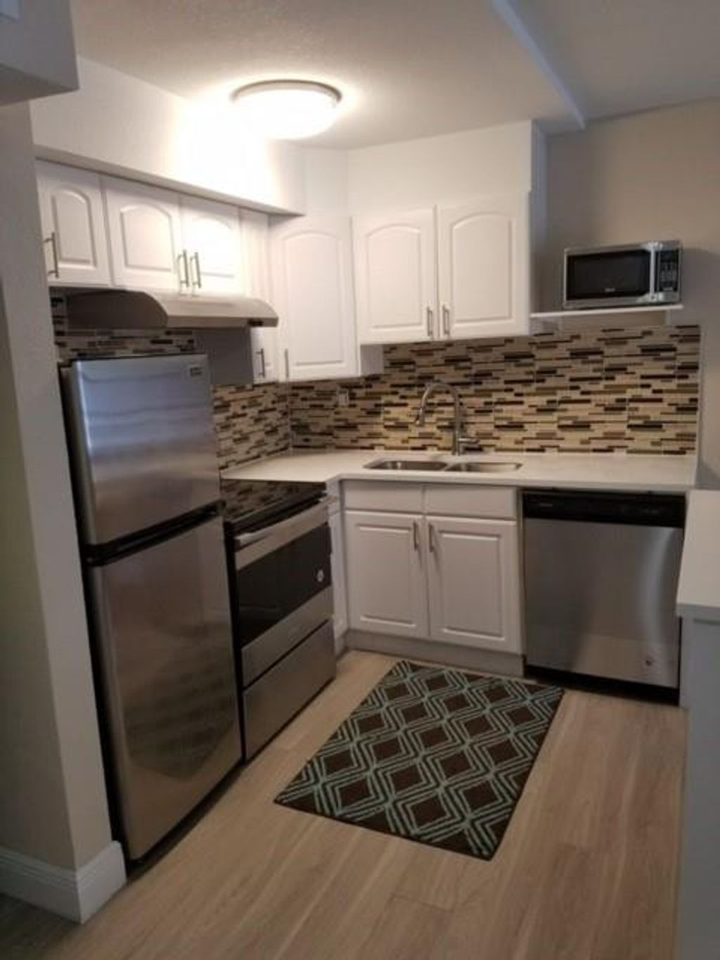 Photo of 1020 NE 17th Way #3, Fort Lauderdale, FL 33304 (MLS # F10538018)