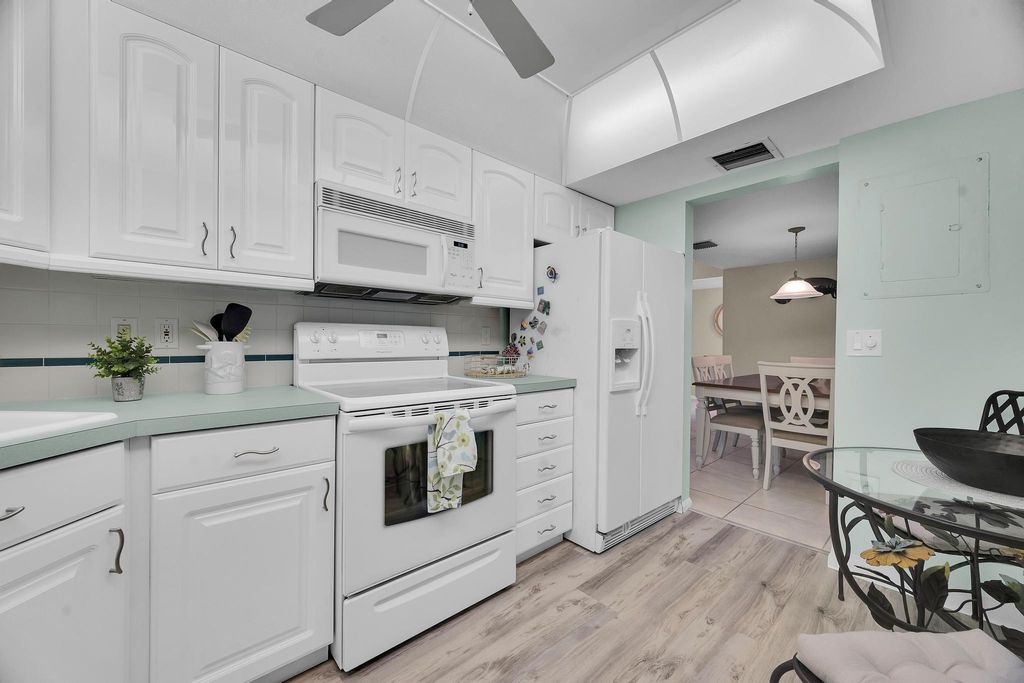 Photo of 3492 NE Causeway Boulevard #103, Jensen Beach, FL 34957 (MLS # R11144783)