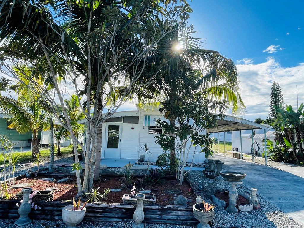 Photo of 8026 SE Wren Avenue, Hobe Sound, FL 33455 (MLS # R11068935)