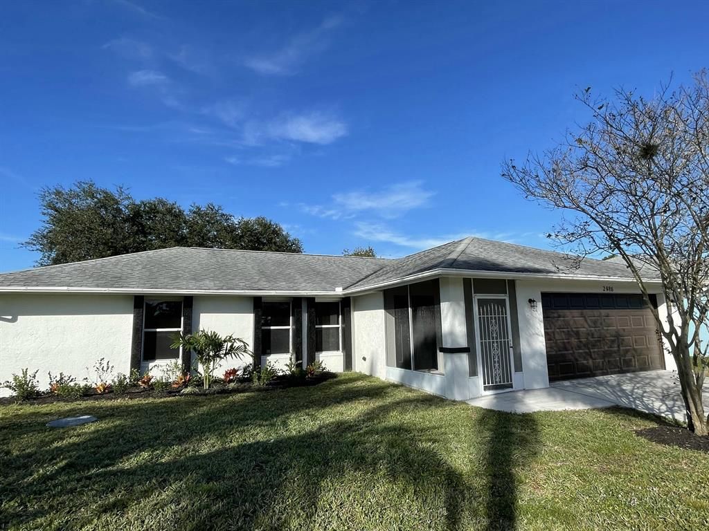 Photo of 2986 SW Romano Road, Port Saint Lucie, FL 34953 (MLS # R10764217)