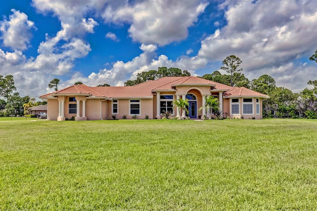Photo of 13051 86th Road N, West Palm Beach, FL 33412 (MLS # R10790152)