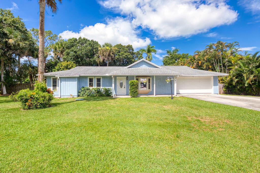 Welcome to your corner lot home nestled in the heart of Stuart! This well-maintained property offers a flexible layout, a cozy fireplace and a 2016 roof for peace of mind. Enjoy multiple living spaces and a versatile bonus room that can easily serve as a 4th bedroom, home office, or den. Step outside to a covered patio and spacious fenced yard--ideal for entertaining, pets, or play. Located just minutes from I-95, top-rated Martin County schools, shopping, and dining, this home combines convenience with comfort in one of Stuart's most desirable locations.