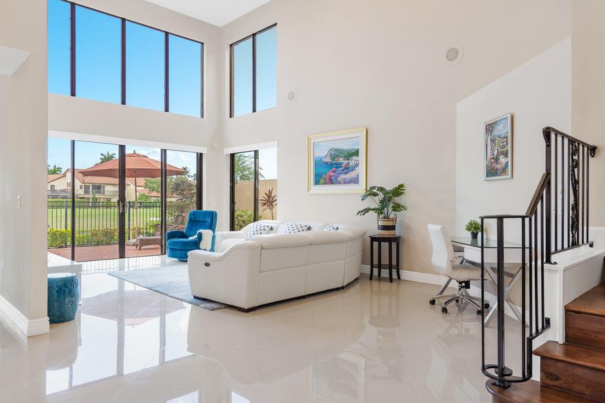 Beautifully appointed, fully furnished 4 bed, 3 bath, 2 car garage townhome offering 2,614 sq ft in the highly desirable, centrally located, non-mandatory golf course community of Boca Pointe. Light-filled interiors with soaring vaulted ceilings and sleek tile flooring create an elegant, airy feel. Spacious eat-in kitchen features stainless steel appliances and granite countertops. Ground level primary suite offers comfort and privacy with a well-appointed ensuite and generous closets. Enjoy relaxing or entertaining from your private fenced patio with tranquil golf and lake views. Community pool and prime location near dining, shopping, and beaches. Schedule your private showing today.