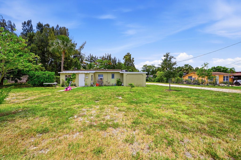 Photo of 700 SW 8th Street, Pompano Beach, FL 33060 (MLS # B26041945)