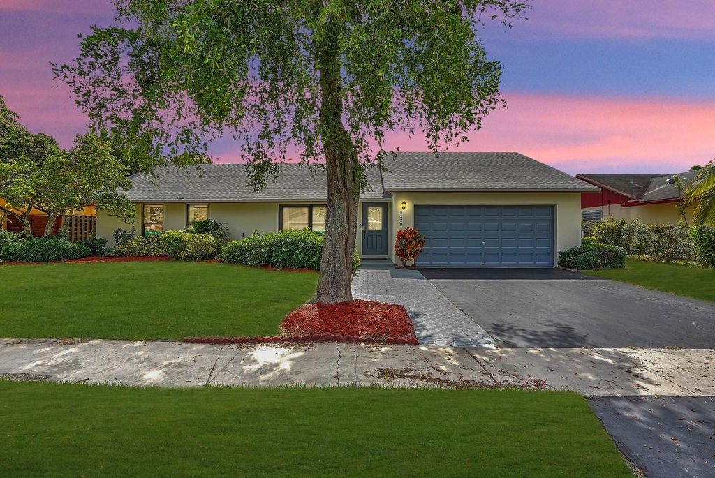 Photo of 8330 NW 52nd Ct, Lauderhill, FL 33351 (MLS # F10533031)