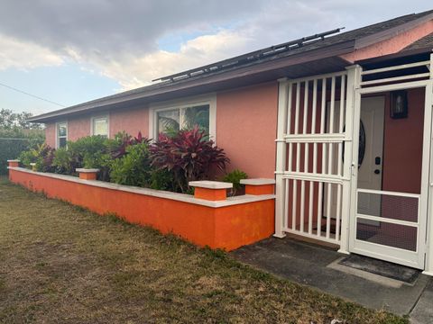 Photo of 1410 NE 14th Terrace, Cape Coral, FL 33909 (MLS # B26024711)