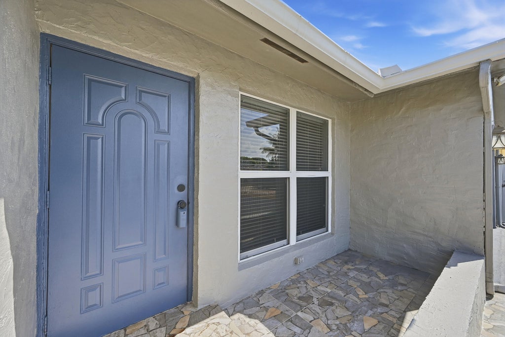 Photo of 5831 NW 56TH Place, Tamarac, FL 33319 (MLS # B26053575)