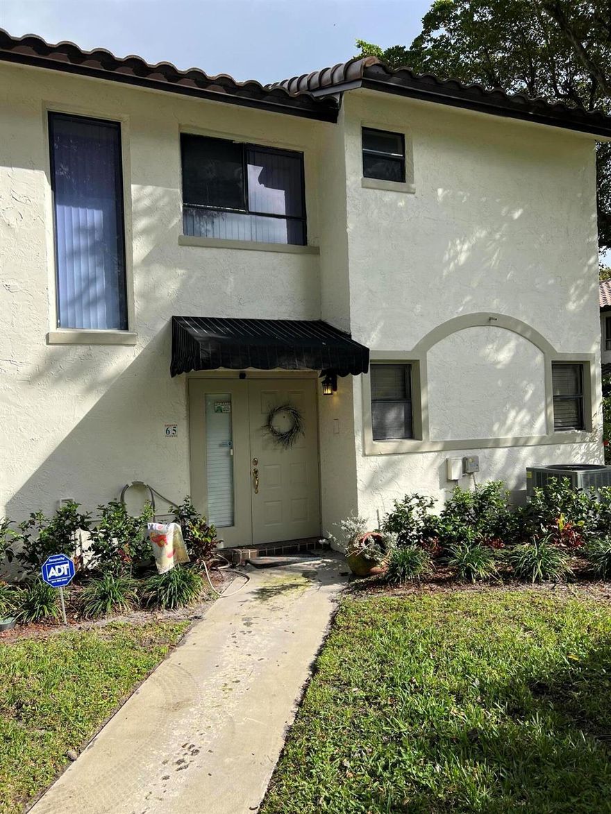 2/2 fully furnished east boca rental in Sunflower Townhome Community. Updated with stainless steel appliances, granite counters, washer/dryer in unit. 2 pools, gym