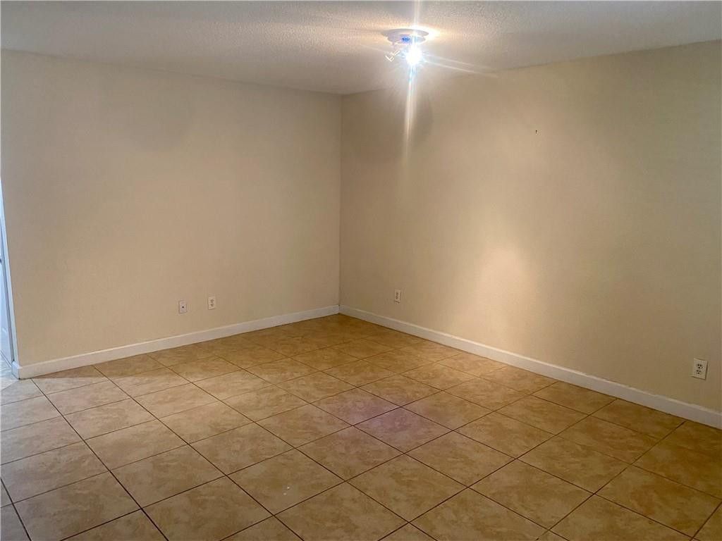 Photo of 777 Riverside Drive #1512, Coral Springs, FL 33071 (MLS # B26022930)