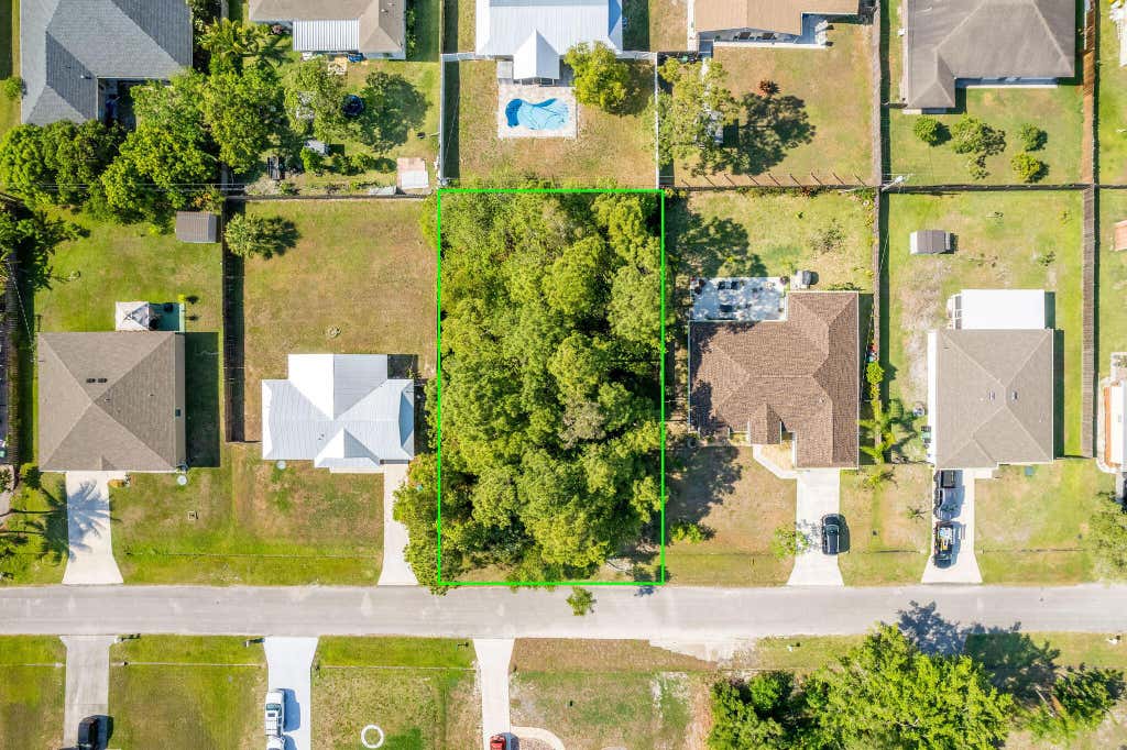 Photo of 565 SW Fairview Avenue, Port Saint Lucie, FL 34953 (MLS # R10985992)