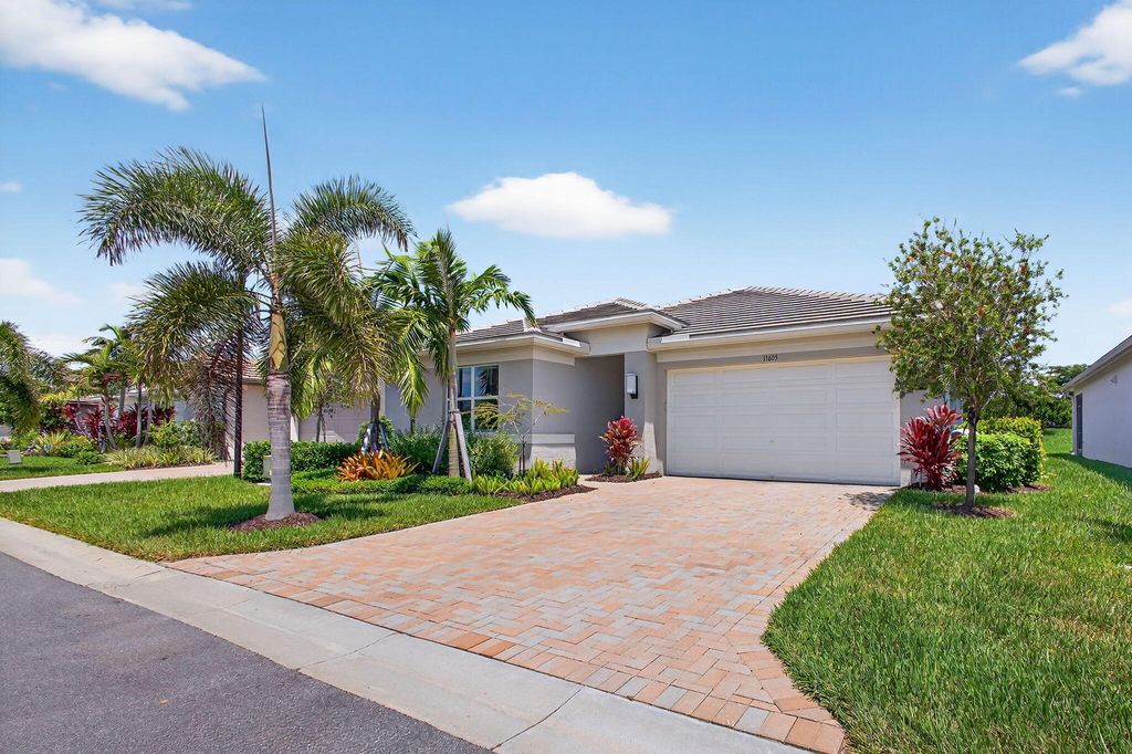 Photo of 13605 SW Oceanus Boulevard, Port Saint Lucie, FL 34987 (MLS # R11111288)