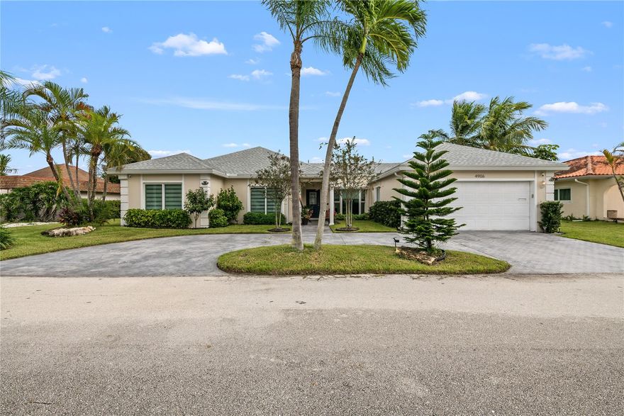 Welcome to this beautifully upgraded residence located in the sought-after Woodlands community, offering resort-style living in a serene golf course setting. This elegant home features impact glass throughout, ensuring both safety & energy efficiency. Step inside to discover rectified oversized porcelain floors that create a modern, seamless look, elegant silhouette window coverings. Gourmet kitchen. Enjoy the best of Florida living with a heated pool & an extended screened enclosure, perfect for entertaining or relaxing in privacy year-round. The garage has been thoughtfully designed w a/c & add'll insulatiion, ideal for working from home yet remains fully functional as a garage.  Experience refined living in one of Tamarac’s most established & picturesque golf course communities.