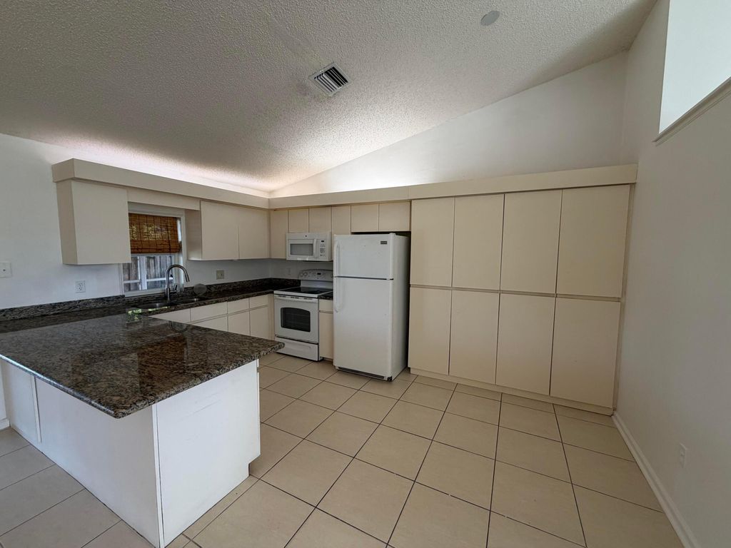 Photo of 1311 W Indies Way, Lantana, FL 33462 (MLS # B26000529)