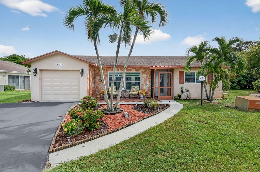 Photo of 4158 Pine Aire Drive, Lake Worth, FL 33467 (MLS # R11130665)