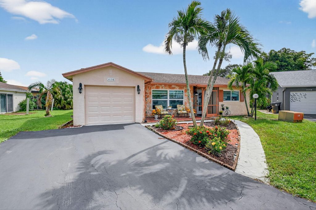 Photo of 4158 Pine Aire Drive, Lake Worth, FL 33467 (MLS # R11130665)