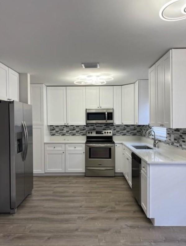 4 Bedroom and 2 1/2 Bathroom. Newly renovated kitchen w/ elegant quartz countertops, full backsplash and brand-new stainless-steel appliances. Brand new waterproof vinyl flooring on the first floor. Spacious dining room and living room. Bedrooms all have new ceiling fans and light fixtures! Master bathroom completely has modern walk-in shower with new vanity and glass doors. Guest bathroom is similar but with bathtub great for children. The community is very safe and gated 24-hour security guard. Please do not miss this rare opportunity to move into this completely unused home and live in luxury. OCCUPIED BY TENANTS UNTIL October 1st, 2025
