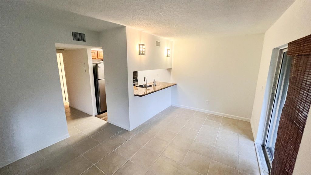 Photo of 6061 N 10th Avenue #144, Greenacres, FL 33463 (MLS # R11148888)