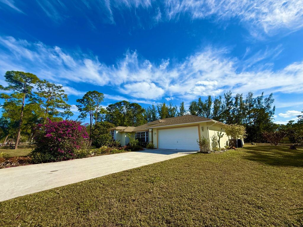 Photo of 13842 78th Place N, West Palm Beach, FL 33412 (MLS # R11057989)