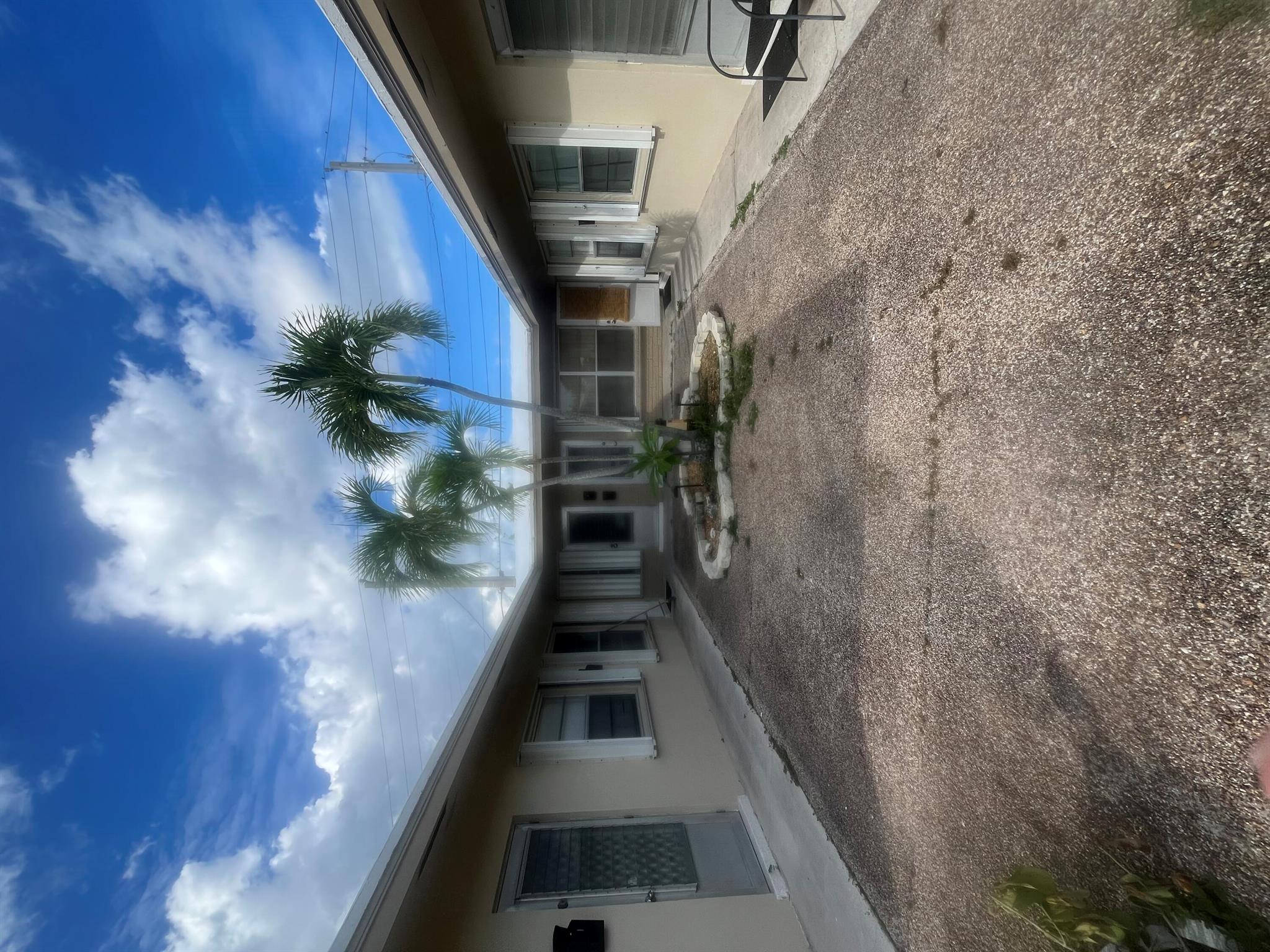 Studio apartment available located in Downtown Deerfield Beach in The Cove walking distance to the beach, pier, LA fitness, Publix, restaurants, bars, retail shopping and much more! Clean studio apartment with full kitchen features refrigerator range. Full bathroom with shower, walk-in closet, and wall a/c. Tile floors! Available immediate move-in! Plenty of natural light. No HOA. Quick Approvals! Laundry/dry cleaners located near to property. Water and sewer included in rent. Accordion hurricane shutters on all windows.