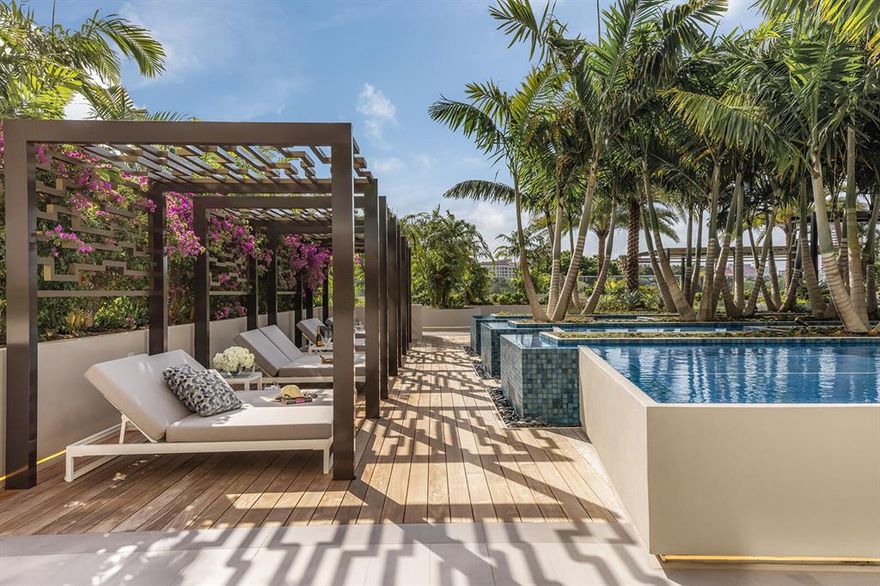 A curated collection of extraordinary private residences in the heart of Boca Raton. Offering an incomparable downtown location, this lush boutique residential retreat is nestled on nearly nine acres, alongside the historic Boca Raton Resort and Club golf course. complemented by 32,000 SF of outdoor amenities, each family who calls ALINA home will enjoy a refined yet relaxed lifestyle. This move in ready residence features European-style designer kitchens by Scavolini, natural stone countertops, Miele appliances, well-appointed master suites and more. Virtual property tours (including ALINA's amenities as well as the interior of this residence) are now available upon request. Residence is move in ready is offered at this price furnished.