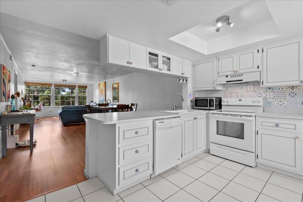 Photo of 1805 PALM BEACH TRACE Drive, Royal Palm Beach, FL 33411 (MLS # B26093687)