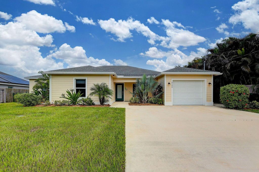 Photo of 4125 SW Winslow Street, Port Saint Lucie, FL 34953 (MLS # R11016612)