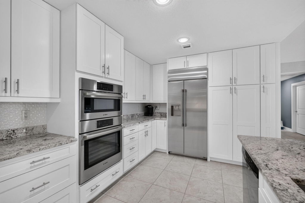 Photo of 1013 BAY COLONY Drive S, Juno Beach, FL 33408 (MLS # B26059783)