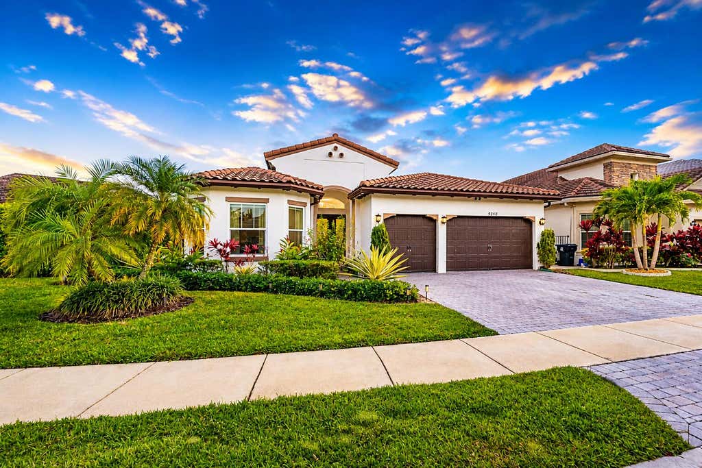 Photo of 9240 Greenspire Lane, Lake Worth, FL 33467 (MLS # R11148074)