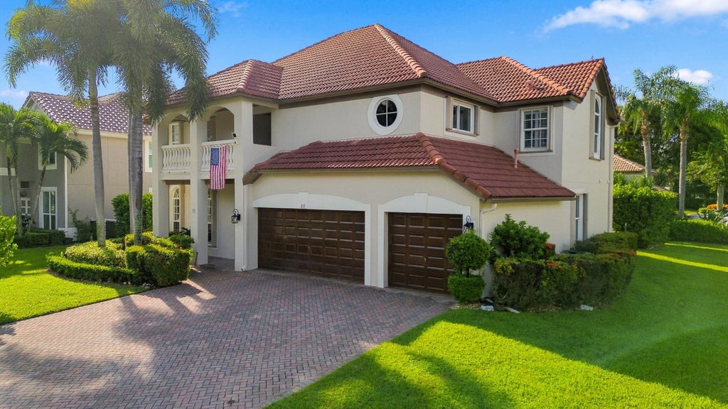 Photo of 217 LONE PINE Drive, Palm Beach Gardens, FL 33410 (MLS # B26079586)