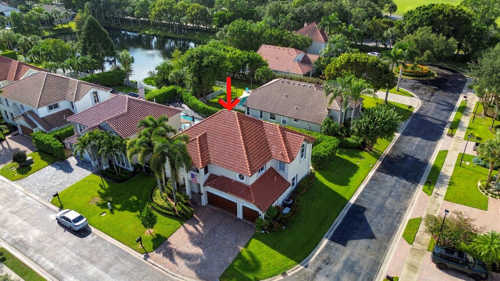 Photo of 217 LONE PINE Drive, Palm Beach Gardens, FL 33410 (MLS # B26079586)