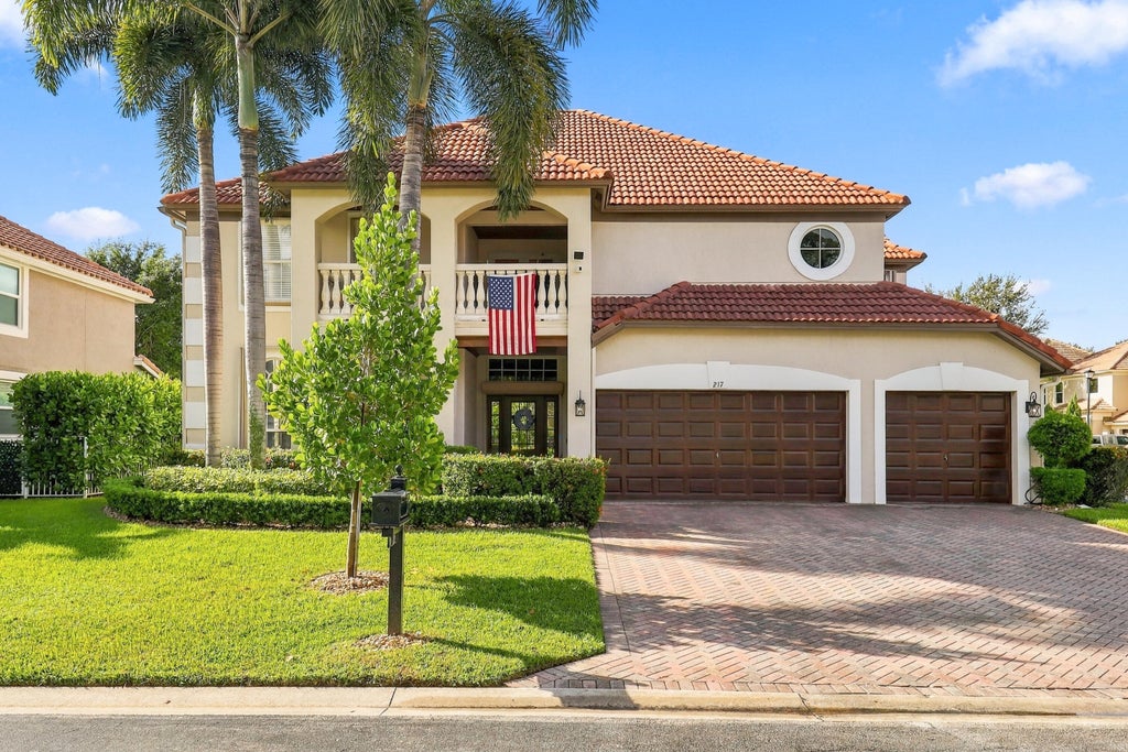 Photo of 217 LONE PINE Drive, Palm Beach Gardens, FL 33410 (MLS # B26079586)