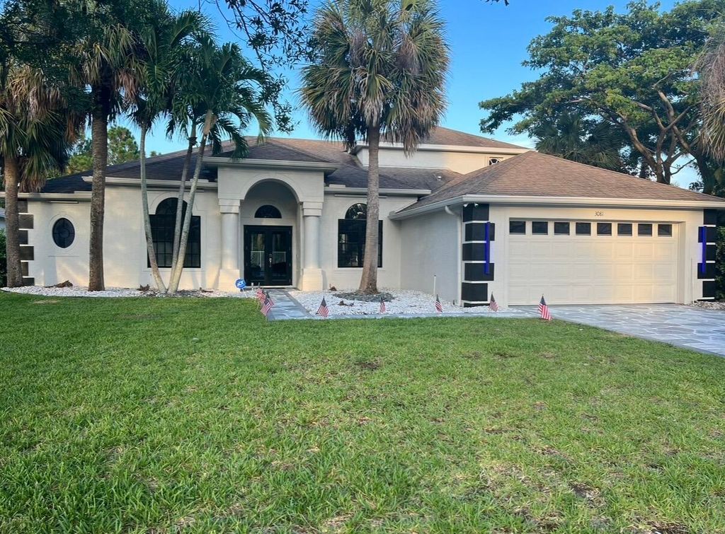 Photo of 3081 NW Windemere Drive, Jensen Beach, FL 34957 (MLS # B26021328)