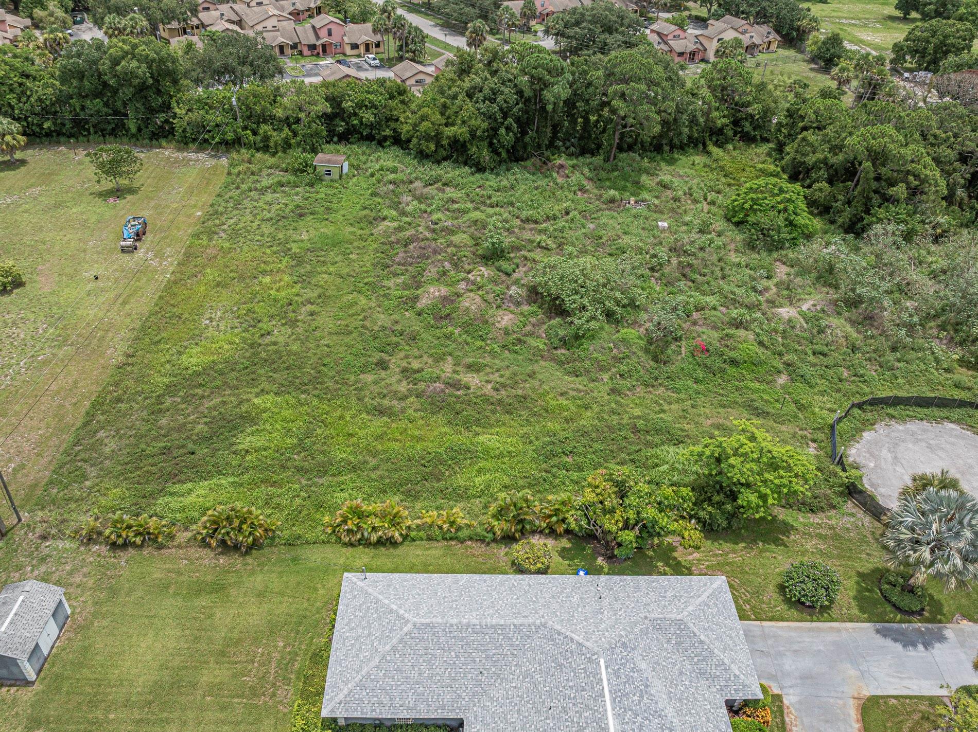 Discover this prime 0.88 acre parcel of vacant land. Perfect for your dream home or a savvy investment. Nestled on 48th Street, at the end of a quiet cul-de-sac, this spacious parcel offers ample room for building. Just minutes from local schools, shopping and I-95 access, this property is primed for potential.