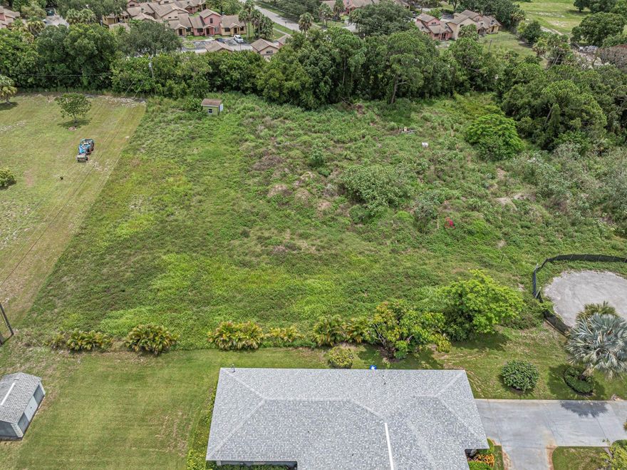 Discover the potential of this prime 0.88 acre vacant parcel, ideal for building your dream home or making a smart investment. Zoned RS-6 for single family residential use, the property allows for a main residence along with an accessory structure such as a detached garage or shed. The lot is mostly cleared, offering easy buildability. Located on 48th Street at the end of a quiet cul-de-sac, this spacious lot offers privacy and plenty of room to build. Conveniently situated near local schools, shopping and with easy access to I-95.