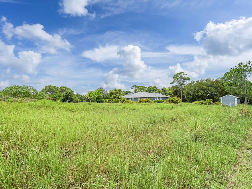 Discover the potential of this prime 0.88 acre vacant parcel, ideal for building your dream home or making a smart investment. Zoned RS-6 for single family residential use, the property allows for a main residence along with an accessory structure such as a detached garage or shed. The lot is mostly cleared, offering easy buildability. Located on 48th Street at the end of a quiet cul-de-sac, this spacious lot offers privacy and plenty of room to build. Conveniently situated near local schools, shopping and with easy access to I-95.