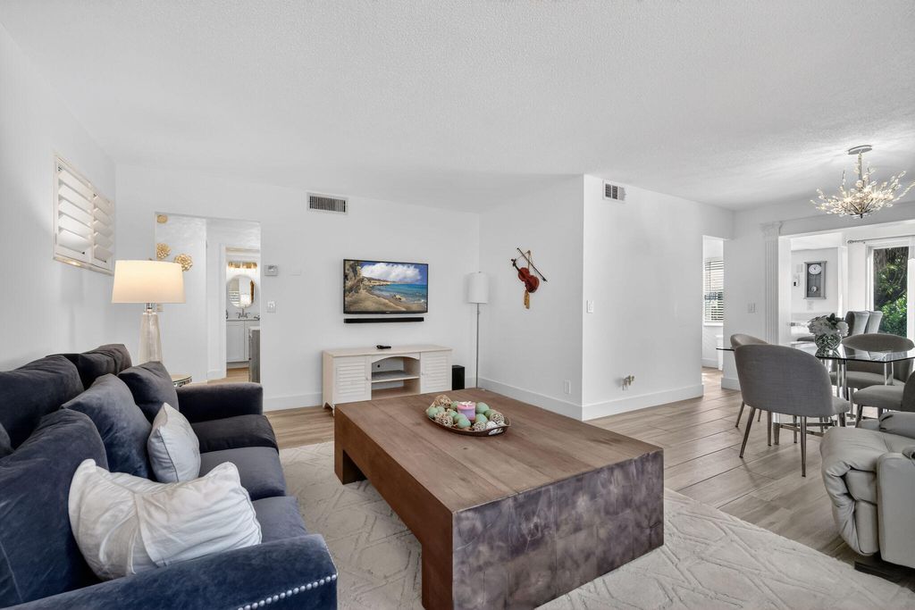 Photo of 33 Colonial Club Drive #104, Boynton Beach, FL 33435 (MLS # R11165398)