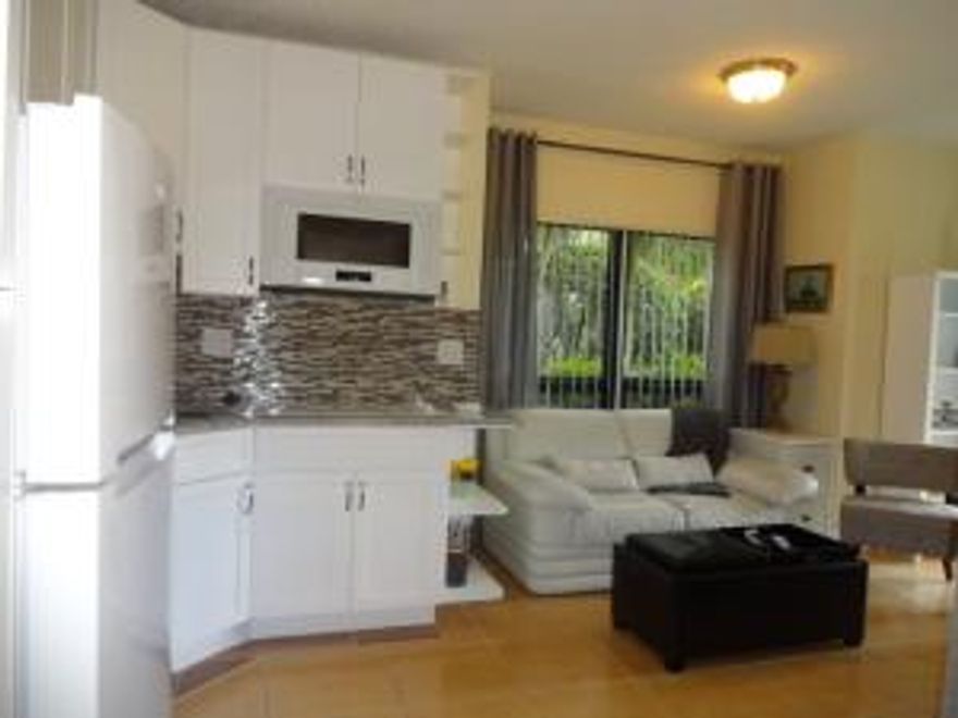 This charming studio apartment has such great use of the limited space. All new furniture and remodeled with a fridge ,range, microwave/convection oven, washer/dryer and yes a dishwasher too. Although this is a studio, there is privacy for the queen size bed from the rest of the unit. Located just minutes away from both Global and WEF and everything else Wellington has to offer. Property does not match Tax records. NO CATS!!